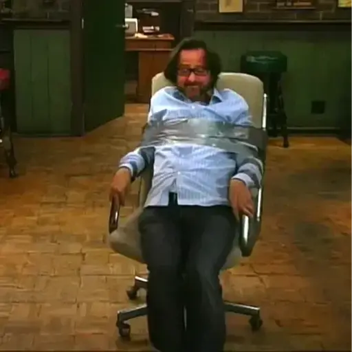 Image of the bar critic duct taped to an office chair in Paddy's
